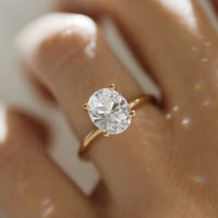 Clarie-oval-cut-3-00-rodguld-forlovningsring