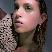 birds-nest-earring-gold-maria-black