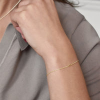 women-unite-drop-bracelet-gold-drakenberg-sjölin