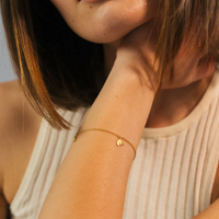 aura-piccolo-guld-dulong