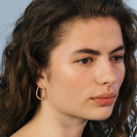 kharisma-orhange-mellan-18k-guld-dulong