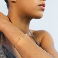 piccolo-armband-guld-sotvattensparla-dulong