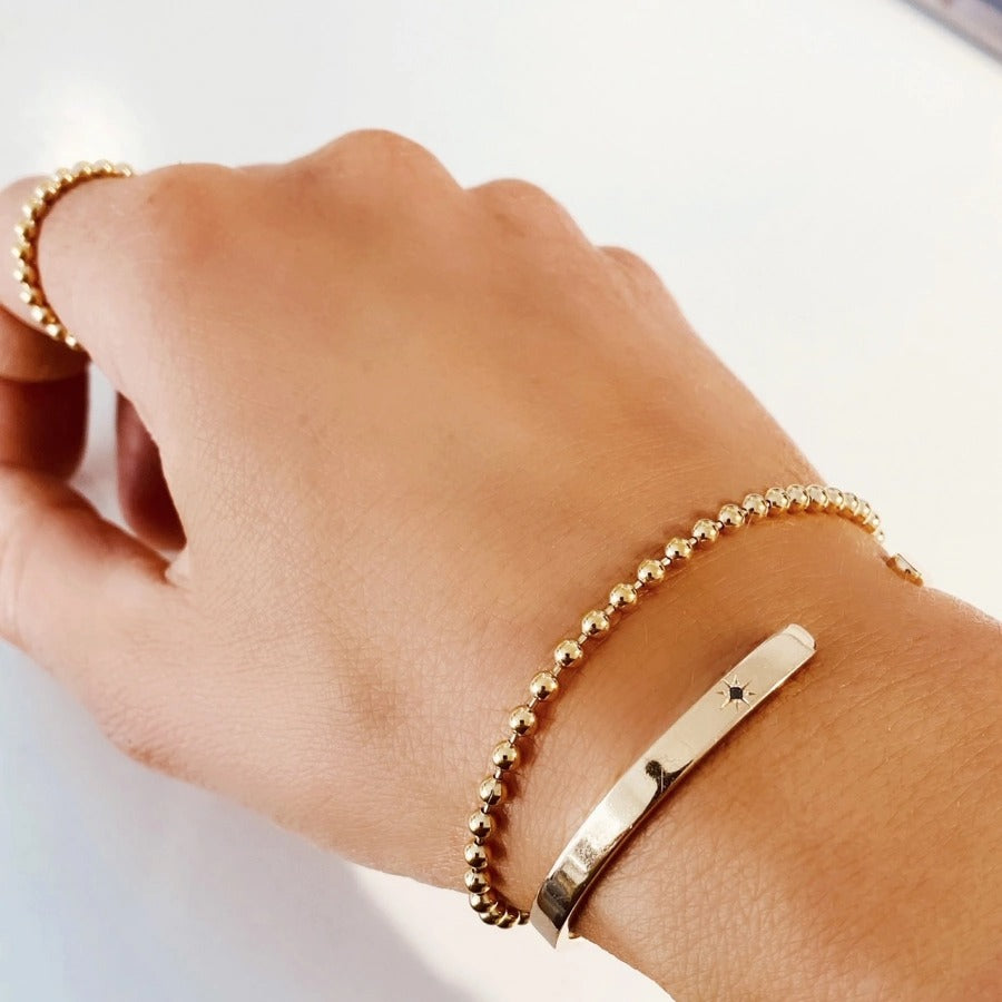 globe-bracelet-gold